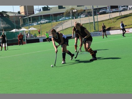 A heated game between the Crusaders Senior womens B team in blue and the Wanderers D womens team in black.