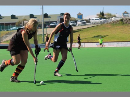 Players fight for the ball during a game between the Crusaders and Wanderers at the Randburg Hockey Stadium.