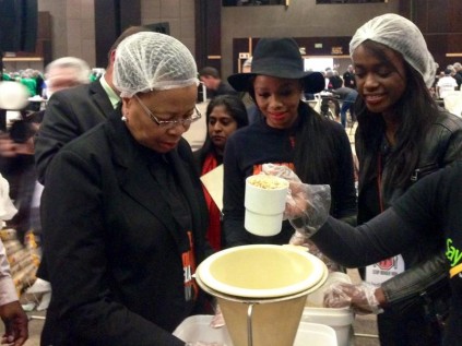 The FNB team assists with meal packages for the Meals in Memory Project.