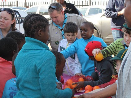 Randpark Ridge Cubs help at a soup kitchen in Cosmo City on 02 August, still feeling inspired by the spirit of late president Nelson Mandela. Photo supplied.