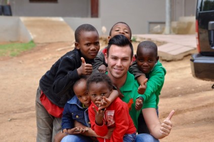 Armand Du Plessis with some of the children from Zandspruit.