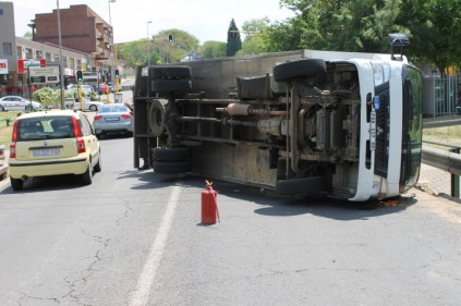 Metro Police say Conrad Drive, Blairgowrie, should have a permanent speed camera to reduce speeding and accidents. Here a truck overturns on the road in October.